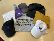 Photo of department t-shirt, hoodie, hat and mug