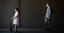 Child and parent both wearing face masks