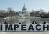 Large impeach sign in from of Capitol Building